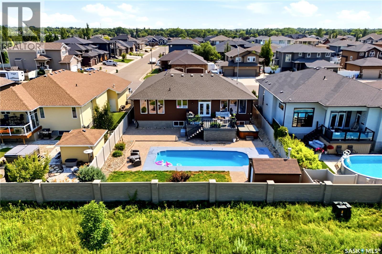 6024 Little Pine Loop, Regina, SK - Outdoor With In Ground Pool