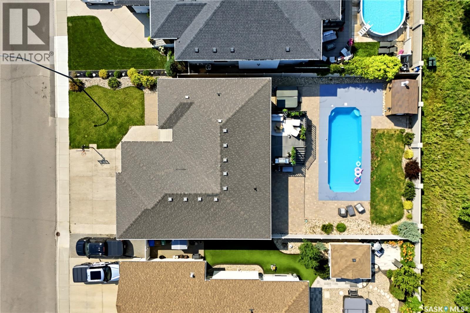 6024 Little Pine Loop, Regina, SK - Outdoor With In Ground Pool