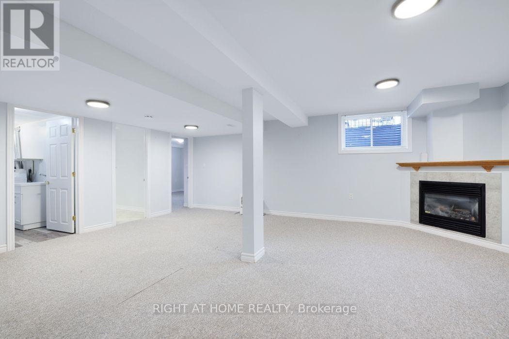 527 Pumpkin Patch Private, Ottawa, ON - Indoor Photo Showing Basement With Fireplace
