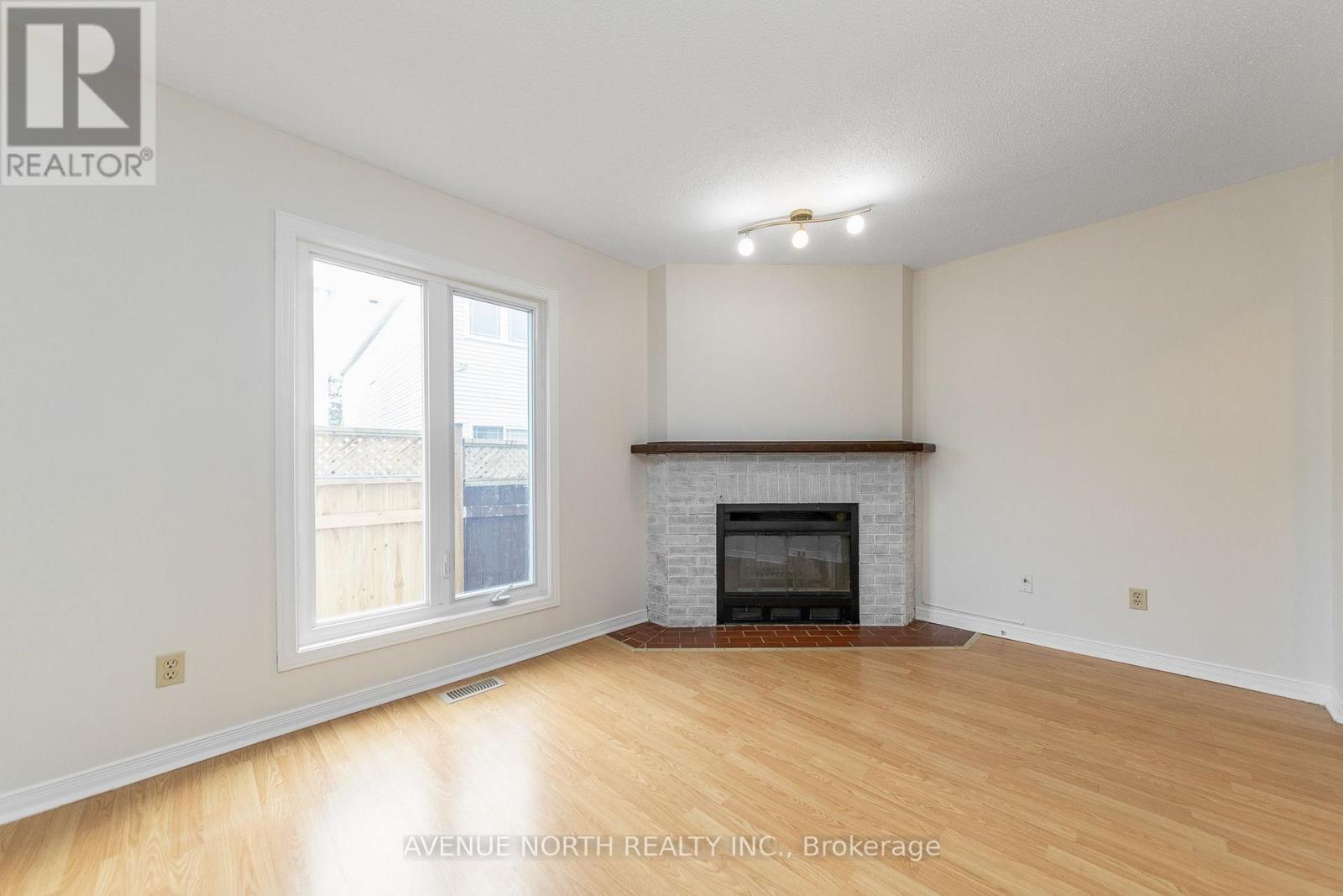861 Karsh Drive, Ottawa, ON - Indoor Photo Showing Living Room With Fireplace