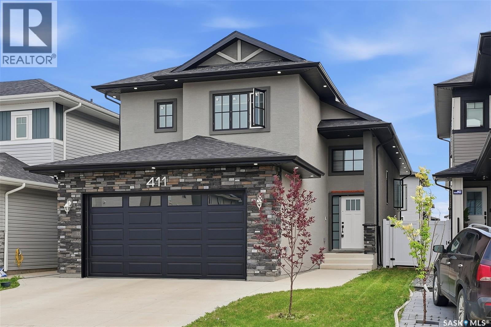 411 Schmeiser Bend, Saskatoon, SK - Outdoor With Facade