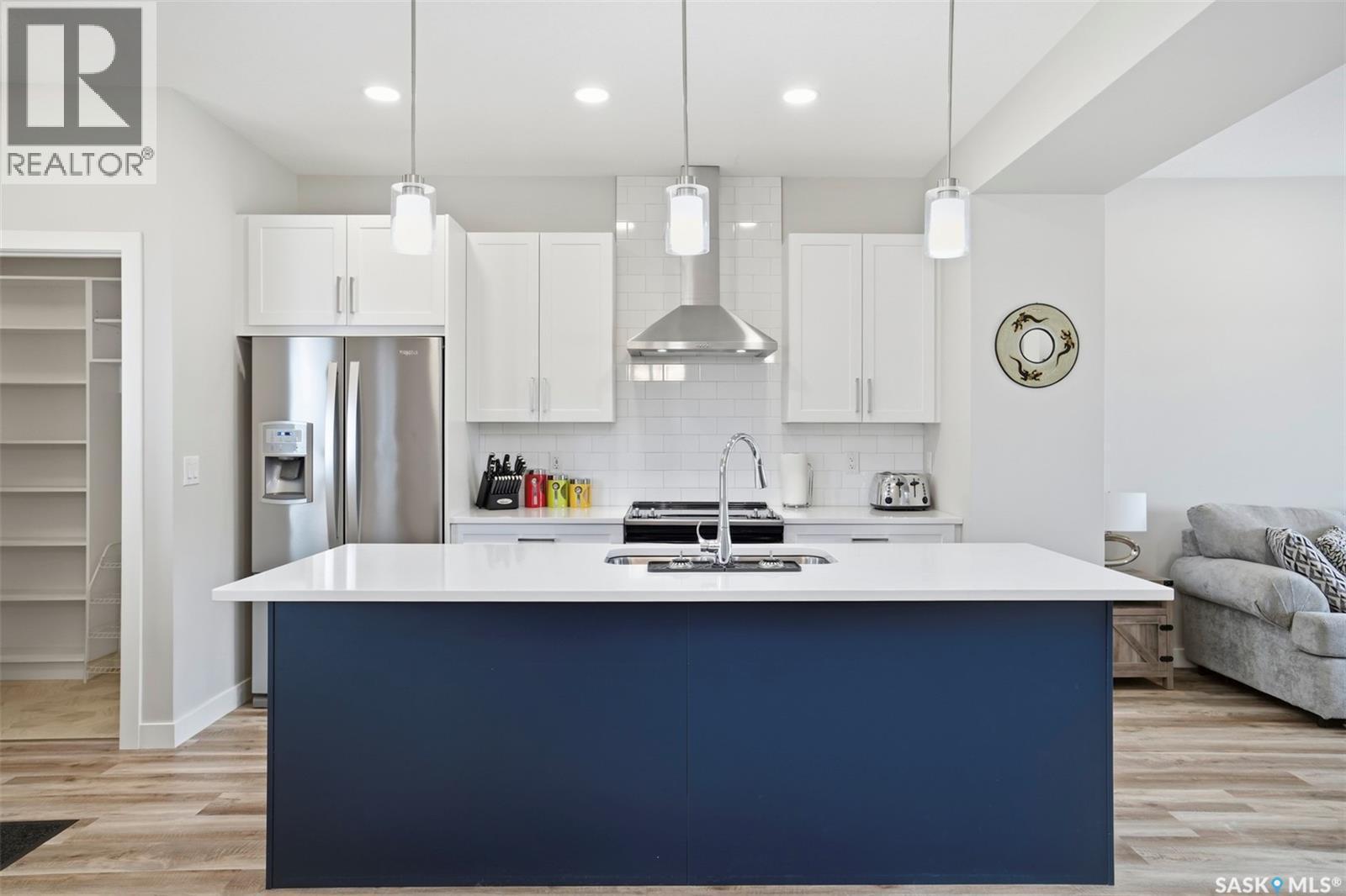 26 619 Evergreen Boulevard, Saskatoon, SK - Indoor Photo Showing Kitchen With Stainless Steel Kitchen With Upgraded Kitchen