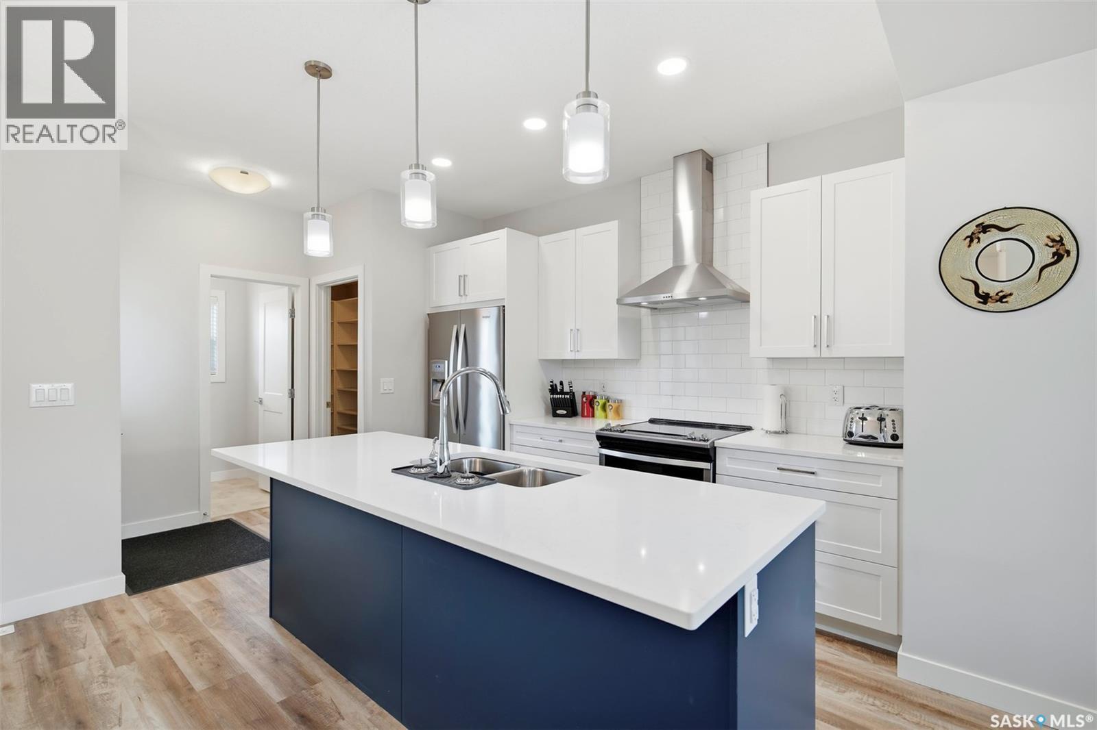 26 619 Evergreen Boulevard, Saskatoon, SK - Indoor Photo Showing Kitchen With Double Sink With Upgraded Kitchen