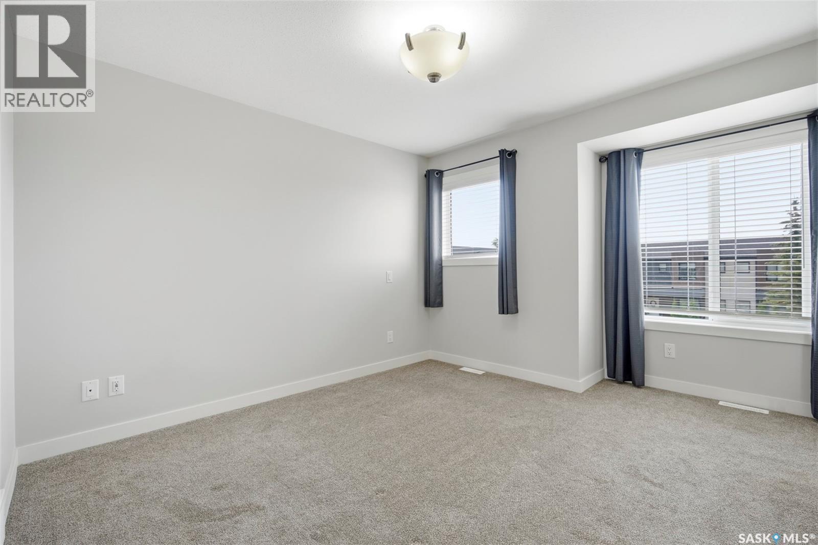26 619 Evergreen Boulevard, Saskatoon, SK - Indoor Photo Showing Other Room
