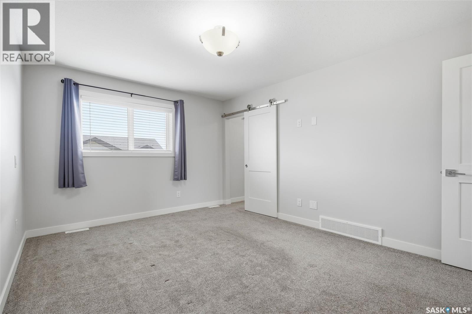 26 619 Evergreen Boulevard, Saskatoon, SK - Indoor Photo Showing Other Room