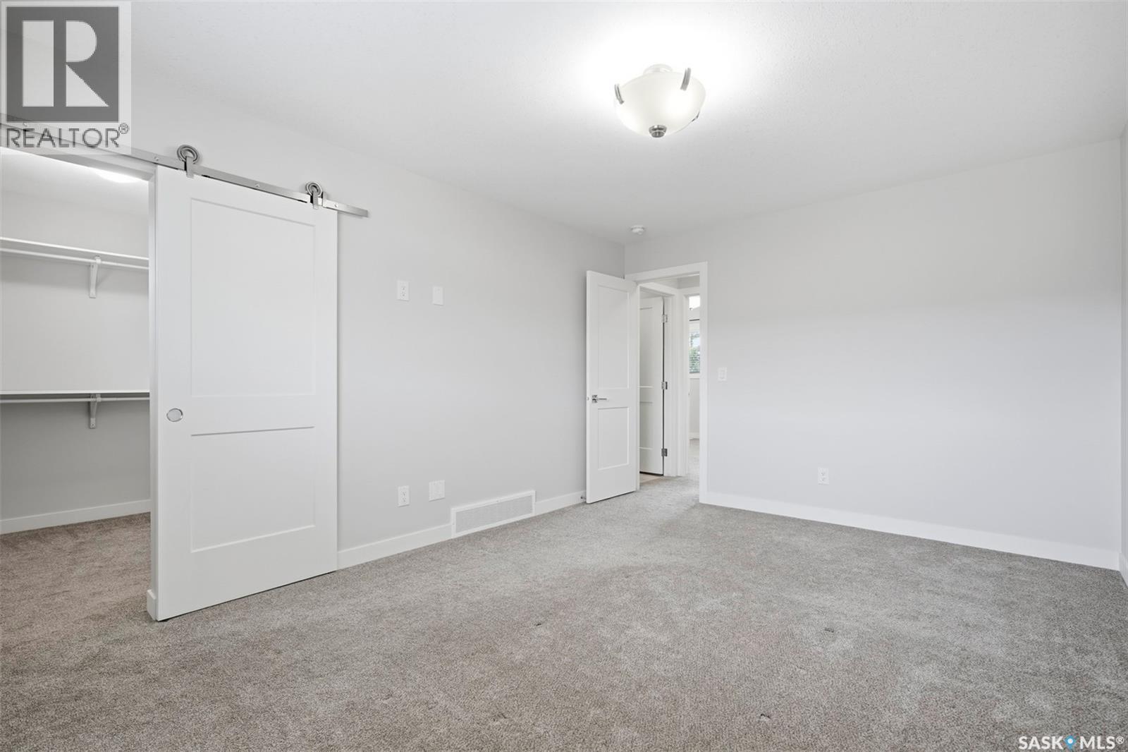 26 619 Evergreen Boulevard, Saskatoon, SK - Indoor Photo Showing Other Room