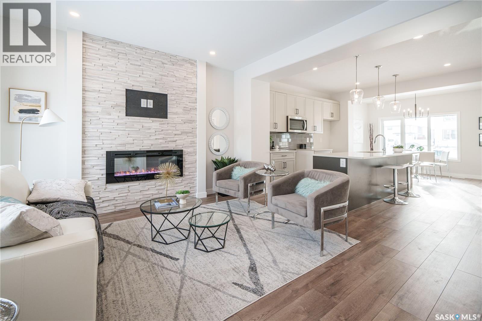 2972 Green Turtle Road, Regina, SK - Indoor Photo Showing Living Room With Fireplace