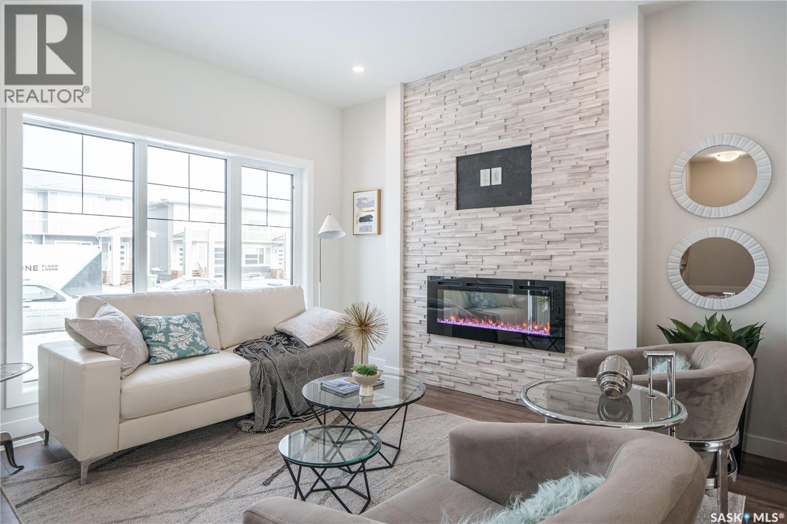 2972 Green Turtle Road, Regina, SK - Indoor Photo Showing Living Room With Fireplace