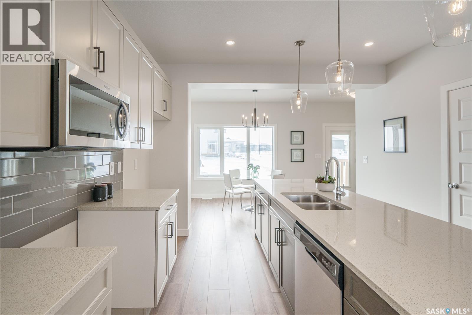 2972 Green Turtle Road, Regina, SK - Indoor Photo Showing Kitchen With Double Sink With Upgraded Kitchen