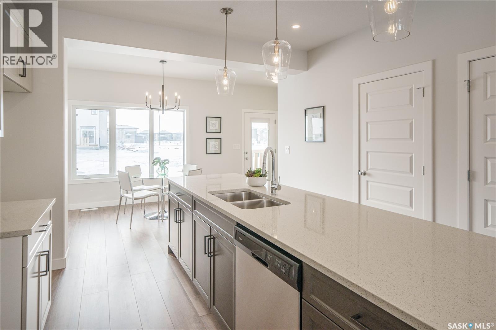 2972 Green Turtle Road, Regina, SK - Indoor Photo Showing Kitchen With Double Sink With Upgraded Kitchen