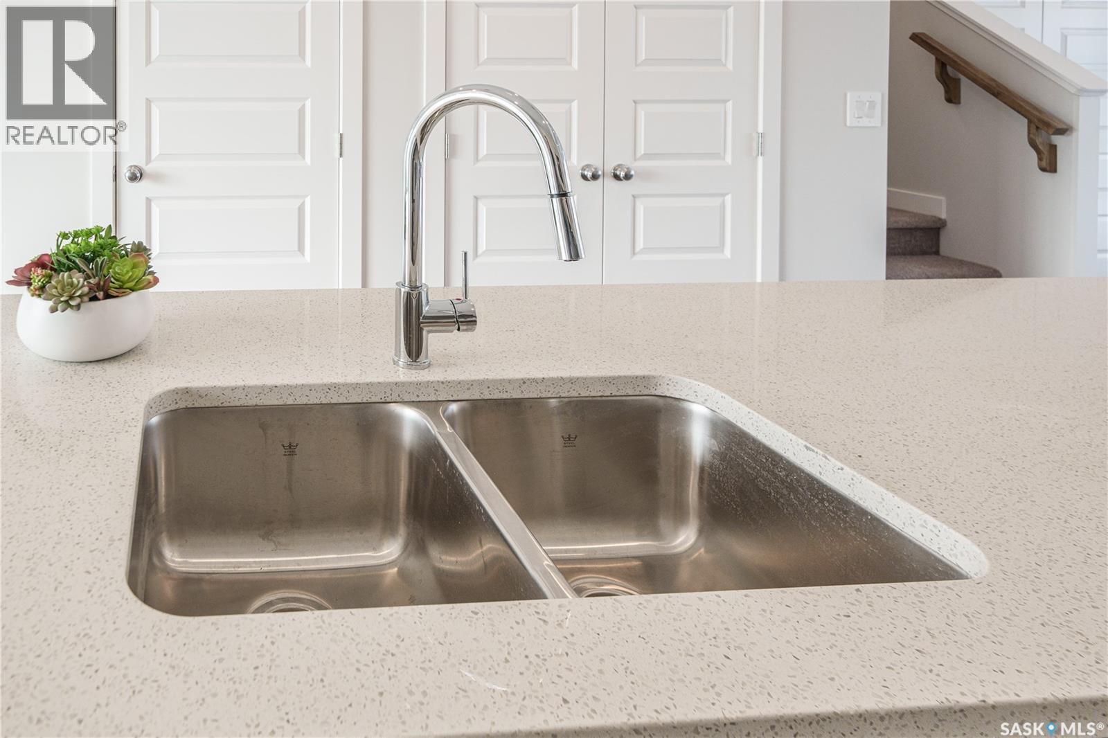 2972 Green Turtle Road, Regina, SK - Indoor Photo Showing Kitchen With Double Sink