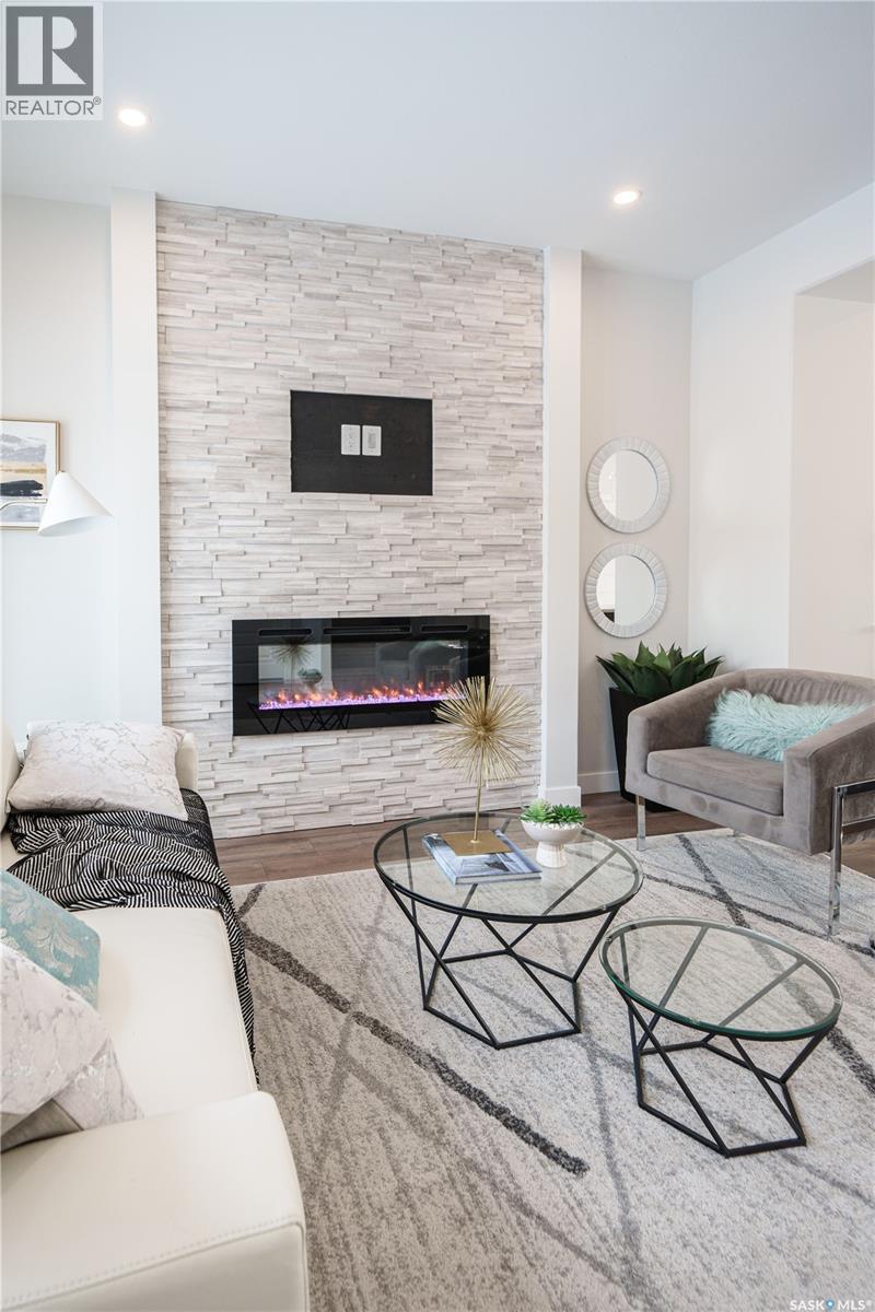 2972 Green Turtle Road, Regina, SK - Indoor Photo Showing Living Room With Fireplace