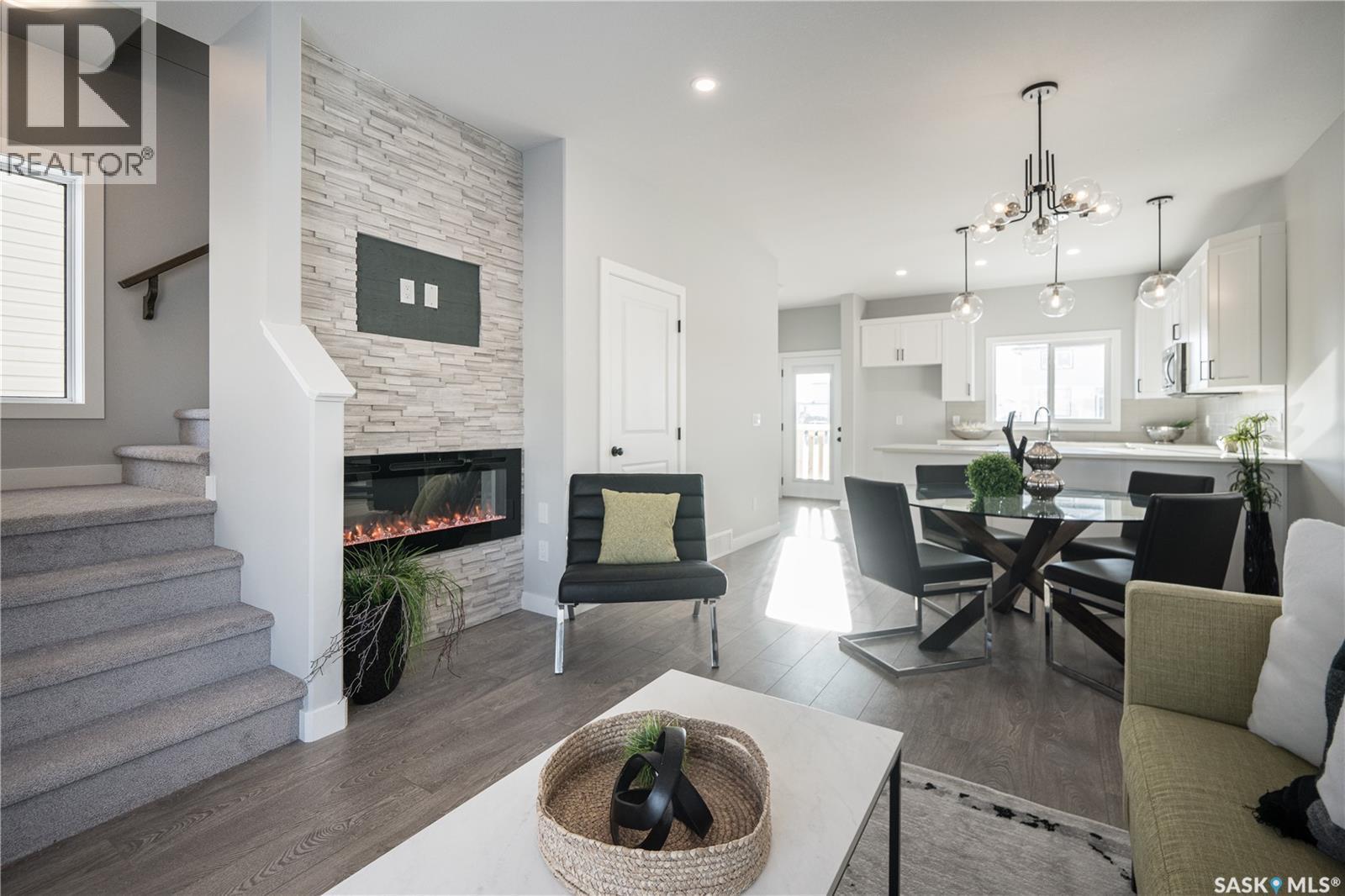 2964 Green Turtle Road, Regina, SK - Indoor Photo Showing Living Room With Fireplace