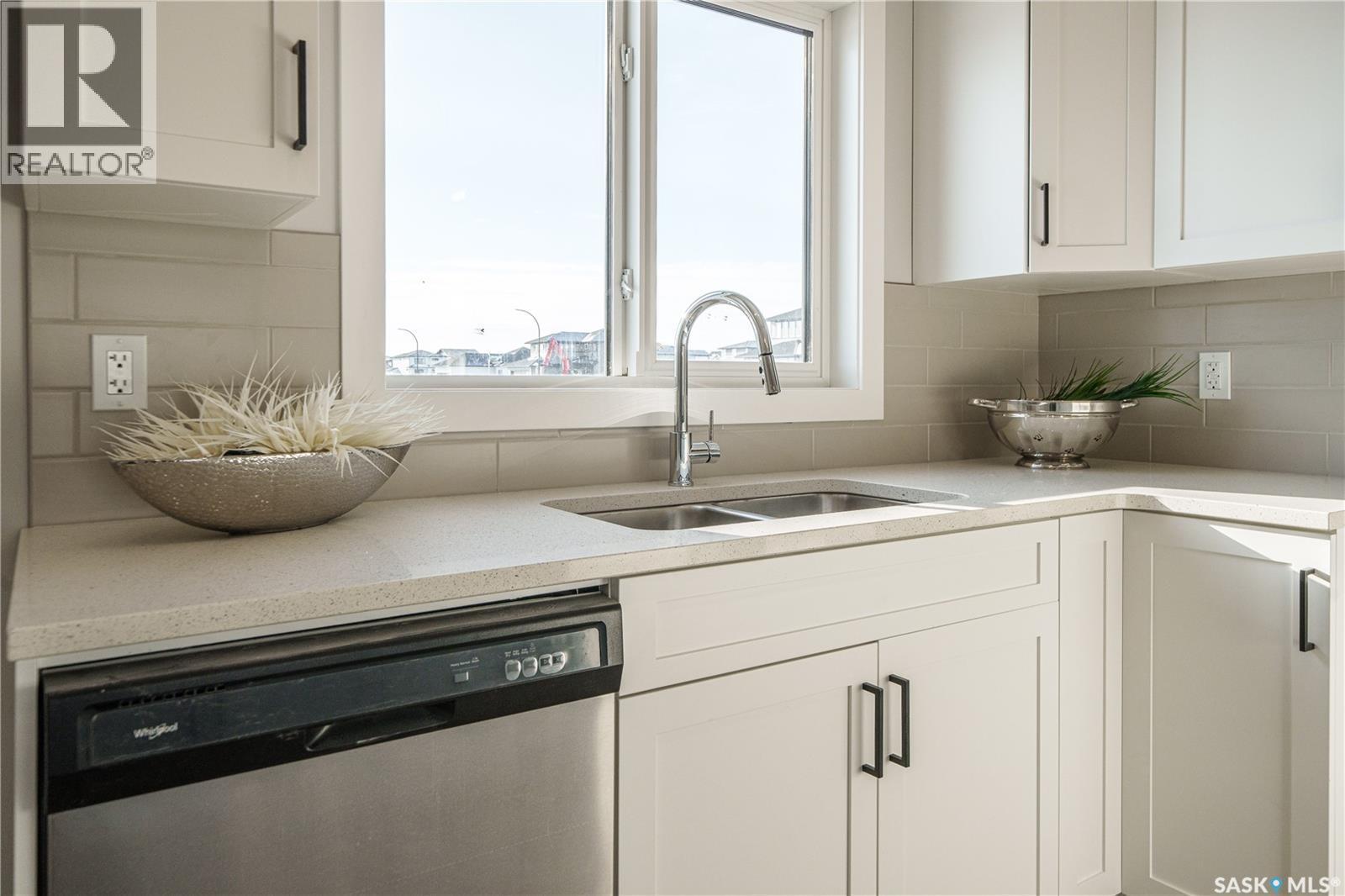2964 Green Turtle Road, Regina, SK - Indoor Photo Showing Kitchen With Double Sink