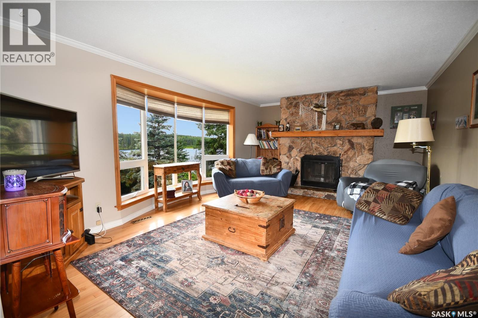340 Johnson Avenue, Big River, SK - Indoor Photo Showing Living Room With Fireplace