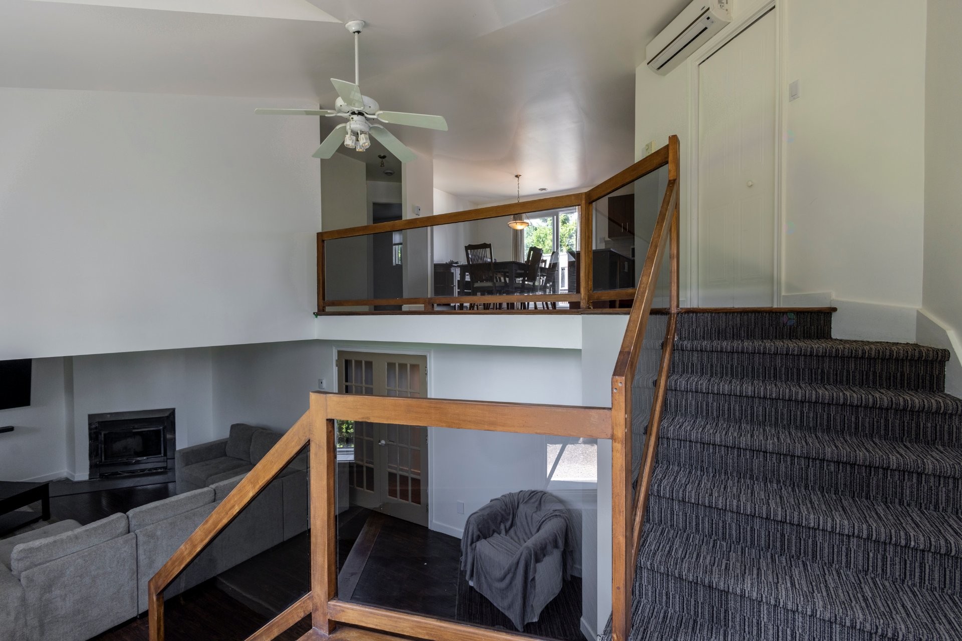 Mezzanine - 3013 Av. Bériot, Boisbriand, QC - Indoor Photo Showing Other Room With Fireplace