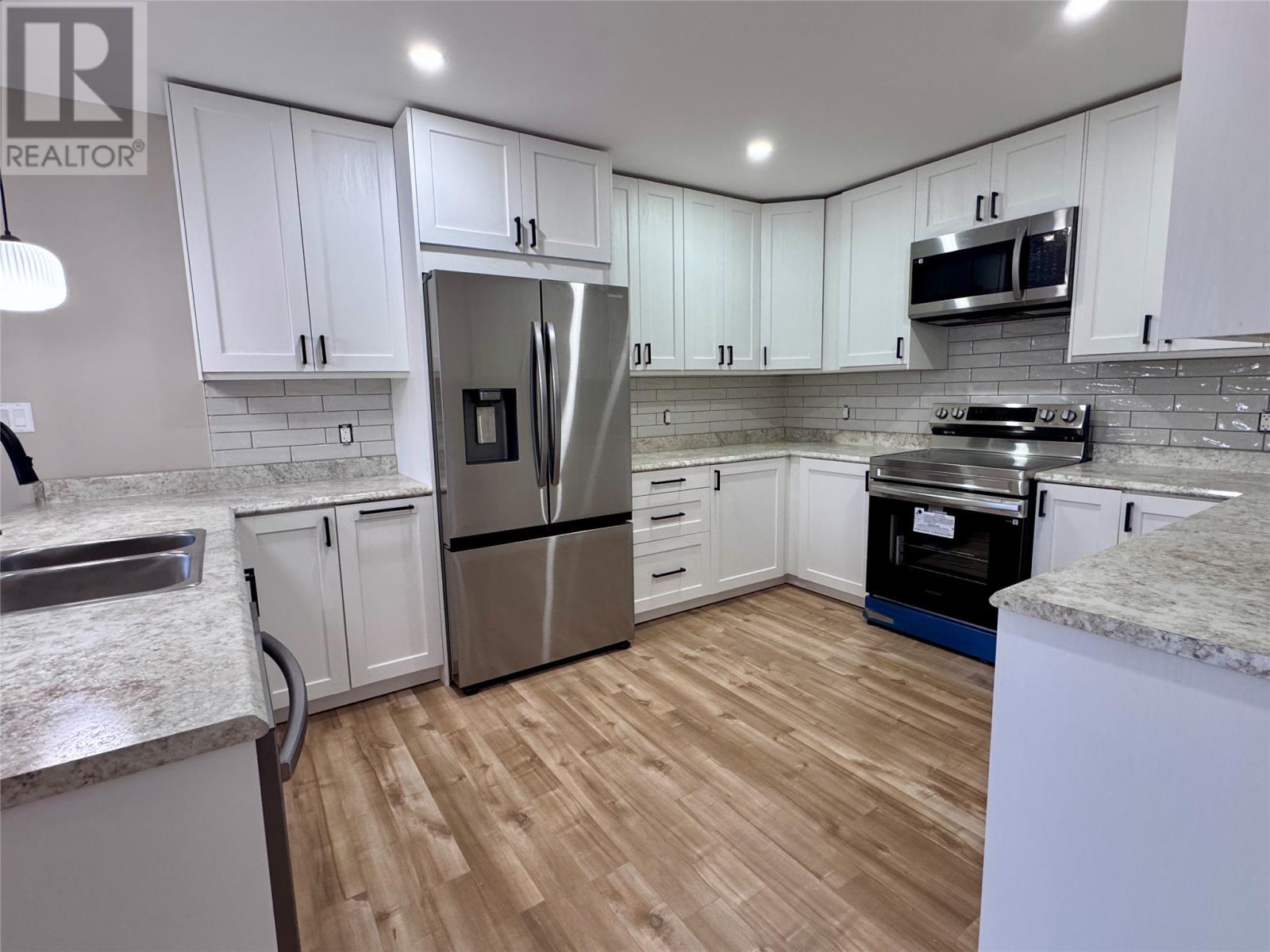 4 Second Avenue, Deer Lake, NL - Indoor Photo Showing Kitchen With Double Sink