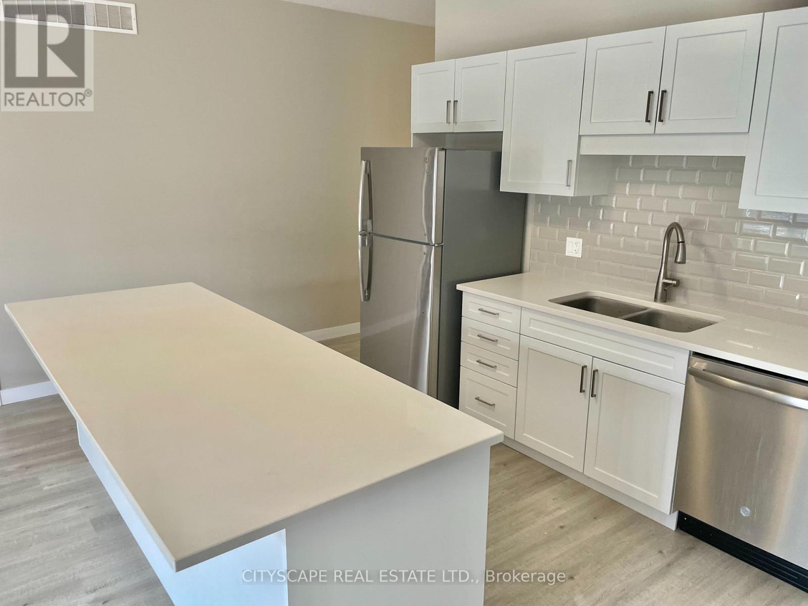 51 Waterthrush Lane, Norfolk, ON - Indoor Photo Showing Kitchen With Stainless Steel Kitchen With Double Sink With Upgraded Kitchen
