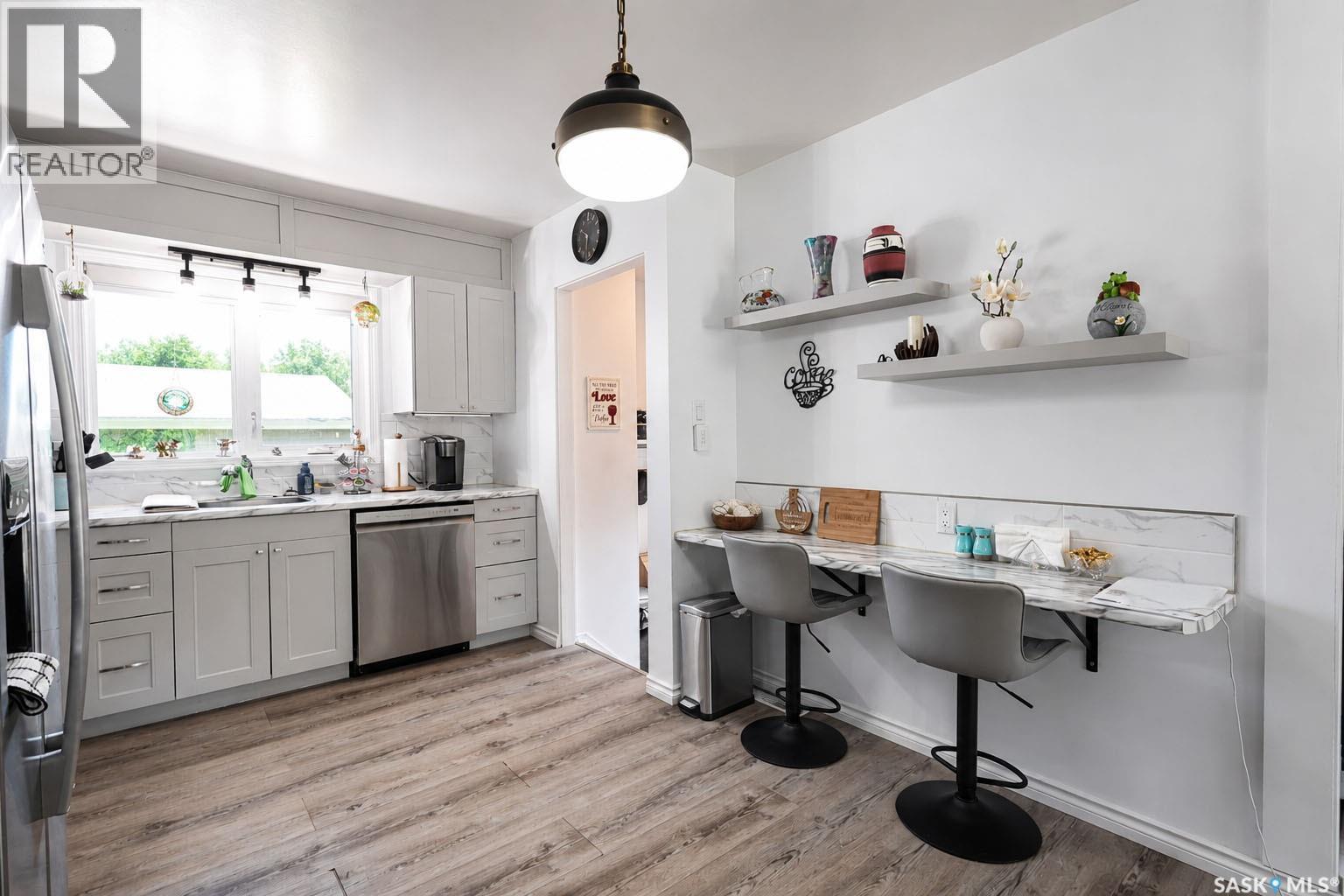 340 28Th Street E, Prince Albert, SK - Indoor Photo Showing Kitchen With Stainless Steel Kitchen