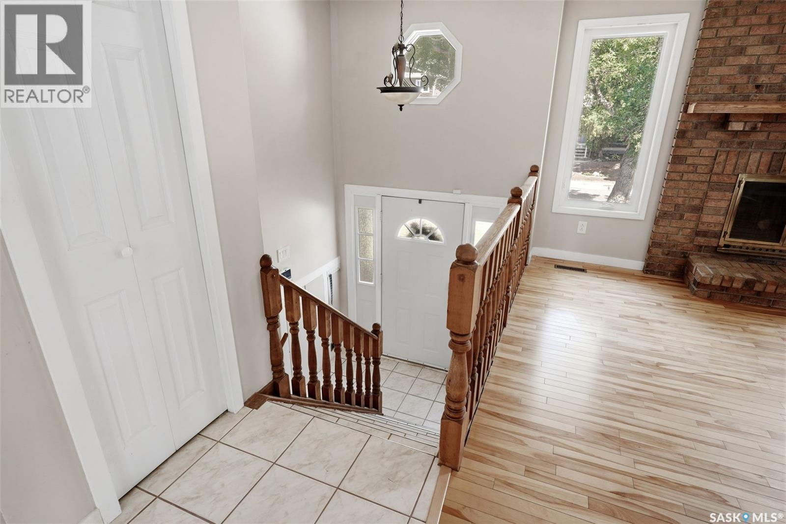 1250 Mcneill Crescent, Regina, SK - Indoor Photo Showing Other Room With Fireplace