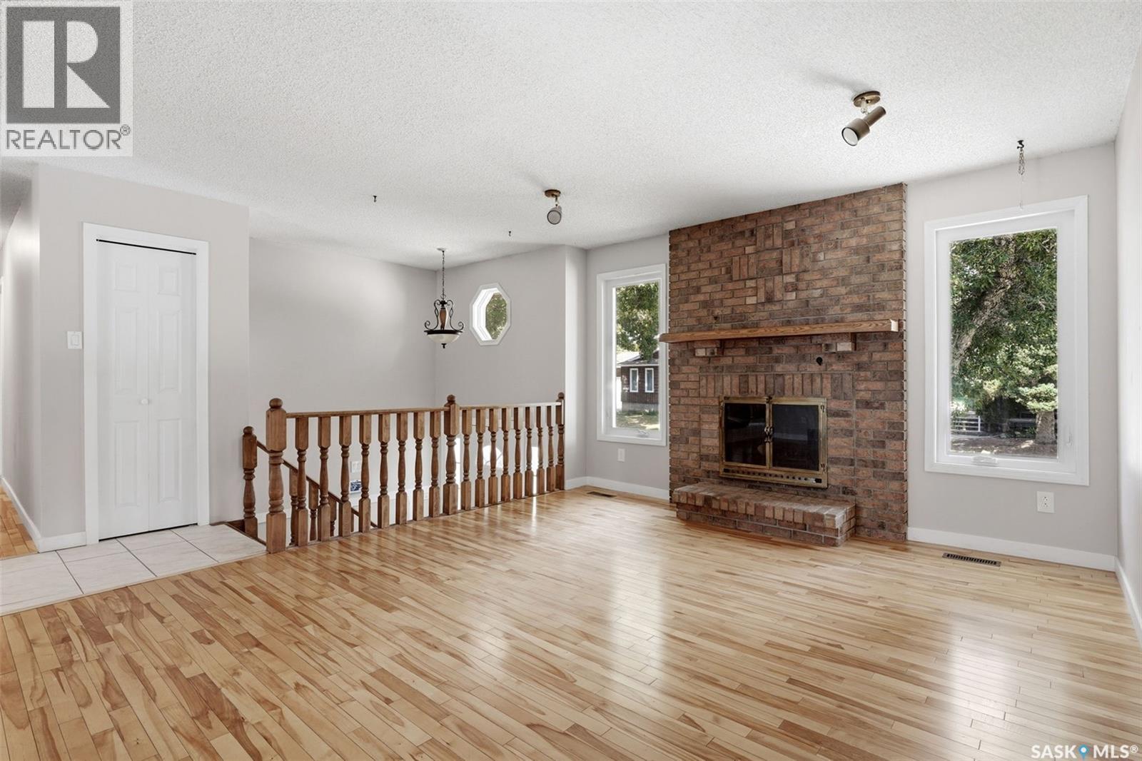 1250 Mcneill Crescent, Regina, SK - Indoor With Fireplace