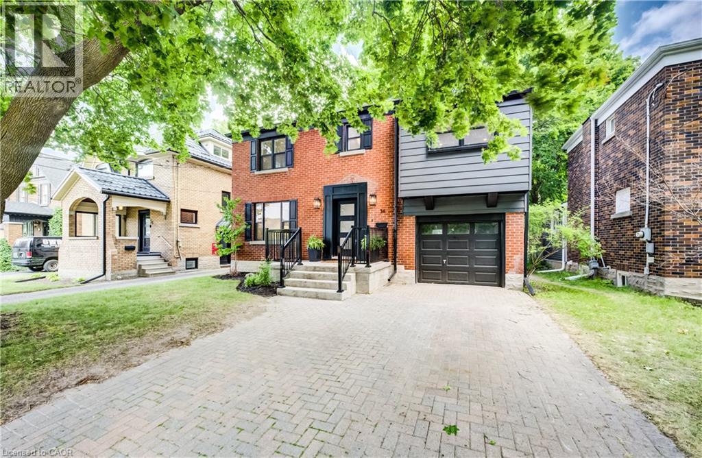 Brick exterior with black trim windows - 34 Moore Avenue N, Waterloo, ON - Outdoor