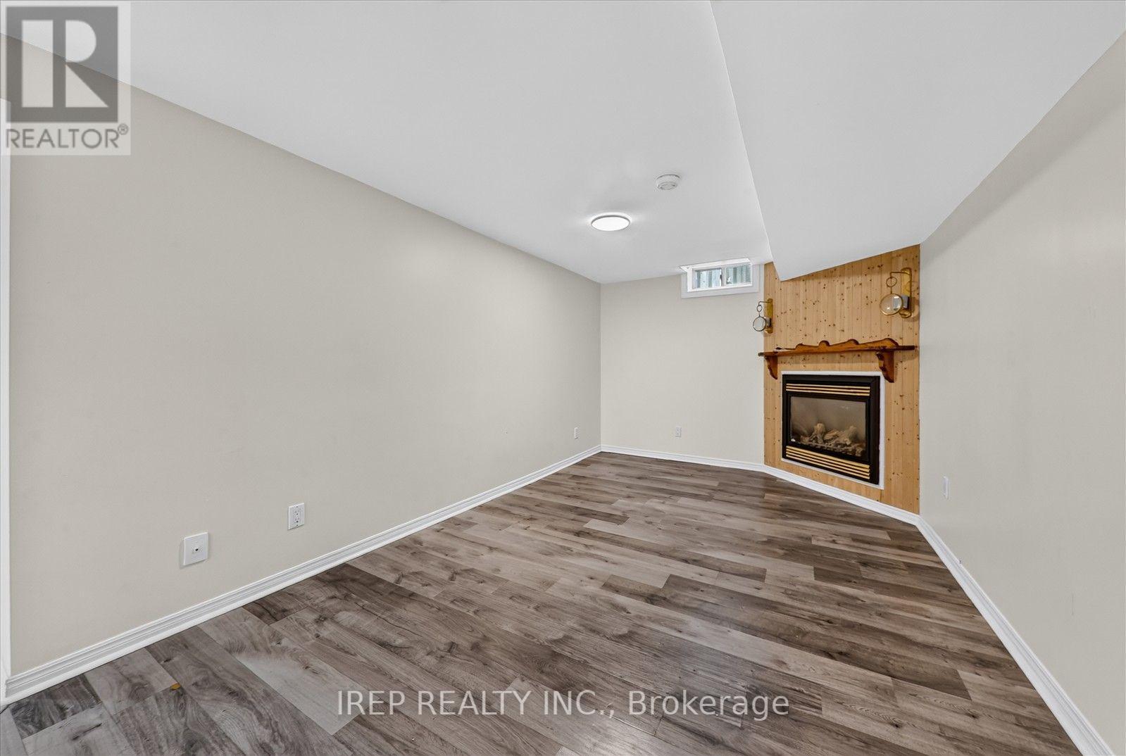Lower - 6 Carmichael Drive, Whitby, ON - Indoor With Fireplace