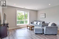 Living Room Boasts South-West to West Treed Views - 