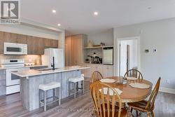 Kitchen Island with Seating on Three Sides - 