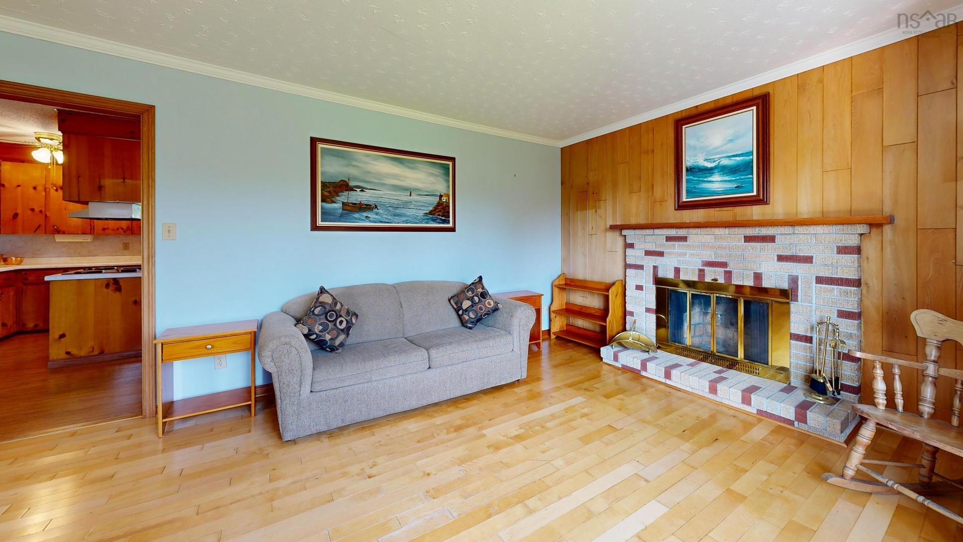 56 North Side Road, Riverport, NS - Indoor Photo Showing Living Room With Fireplace