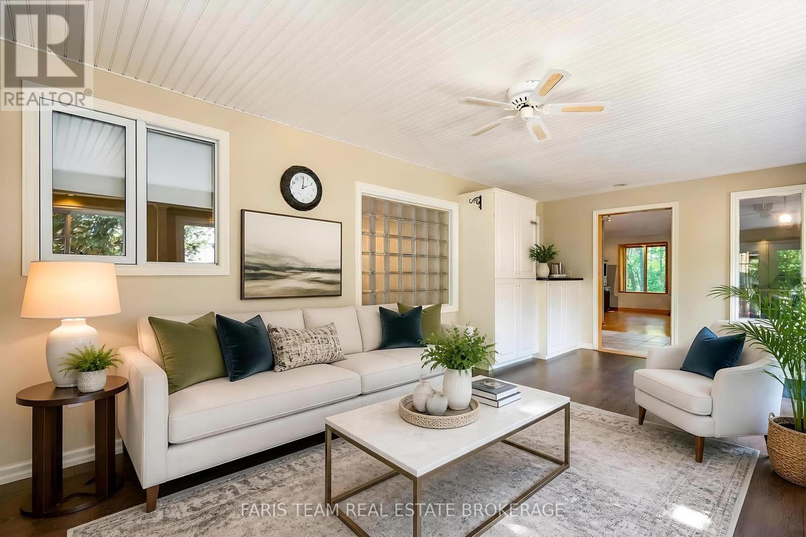 Virtually Staged - 2554 Champlain Road, Tiny, ON - Indoor Photo Showing Living Room