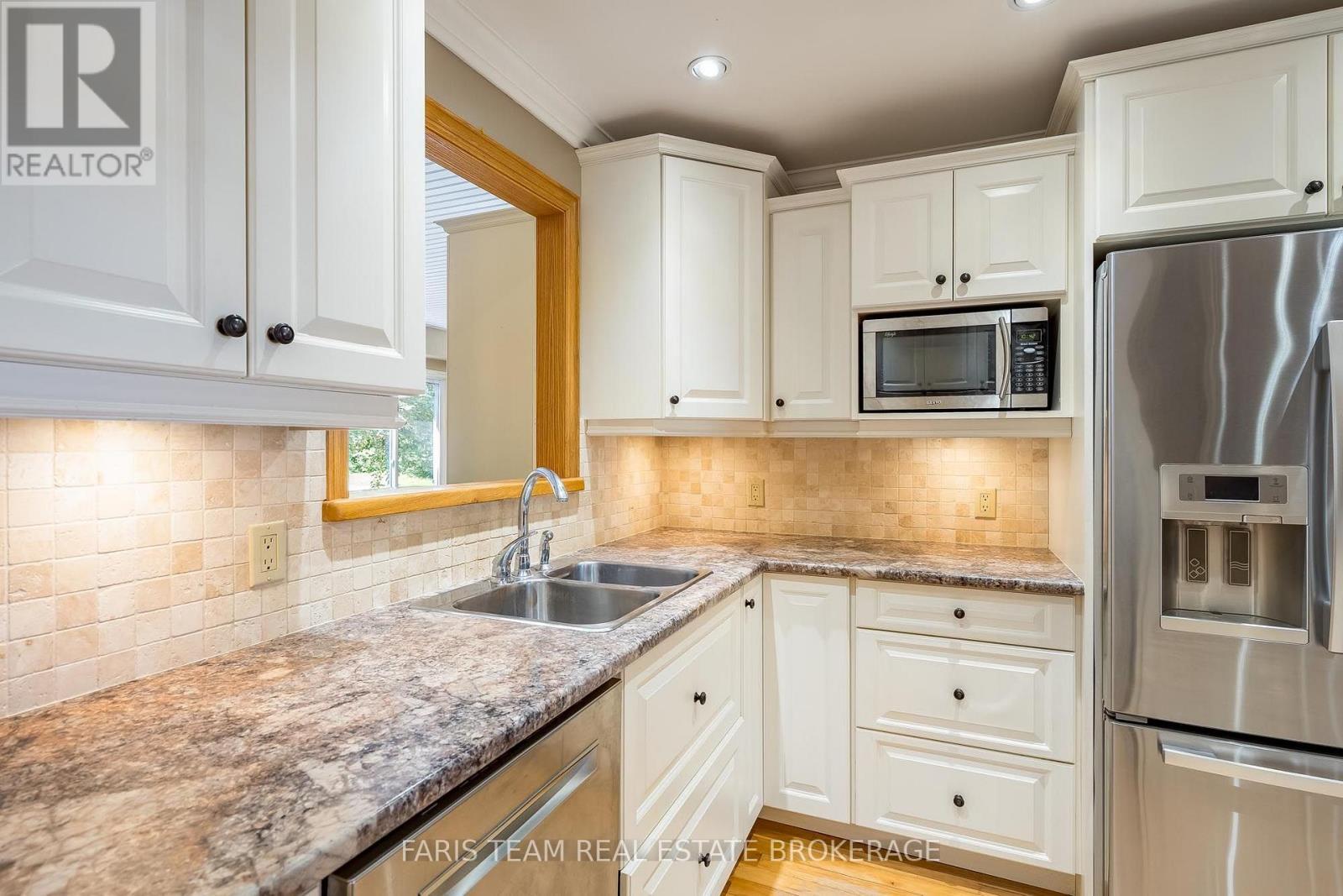 2554 Champlain Road, Tiny, ON - Indoor Photo Showing Kitchen With Double Sink
