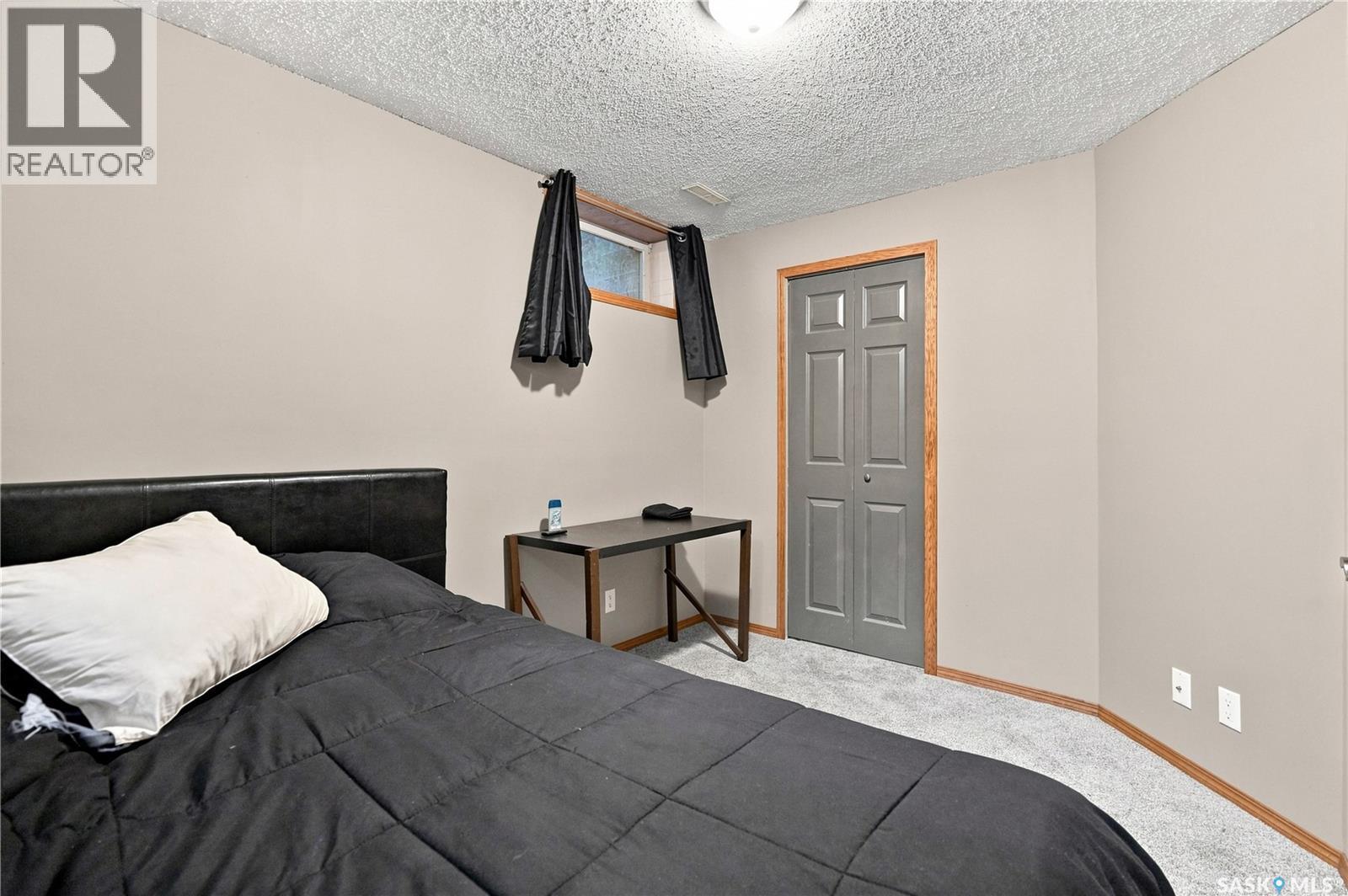 1409 Duffield Street W, Moose Jaw, SK - Indoor Photo Showing Bedroom