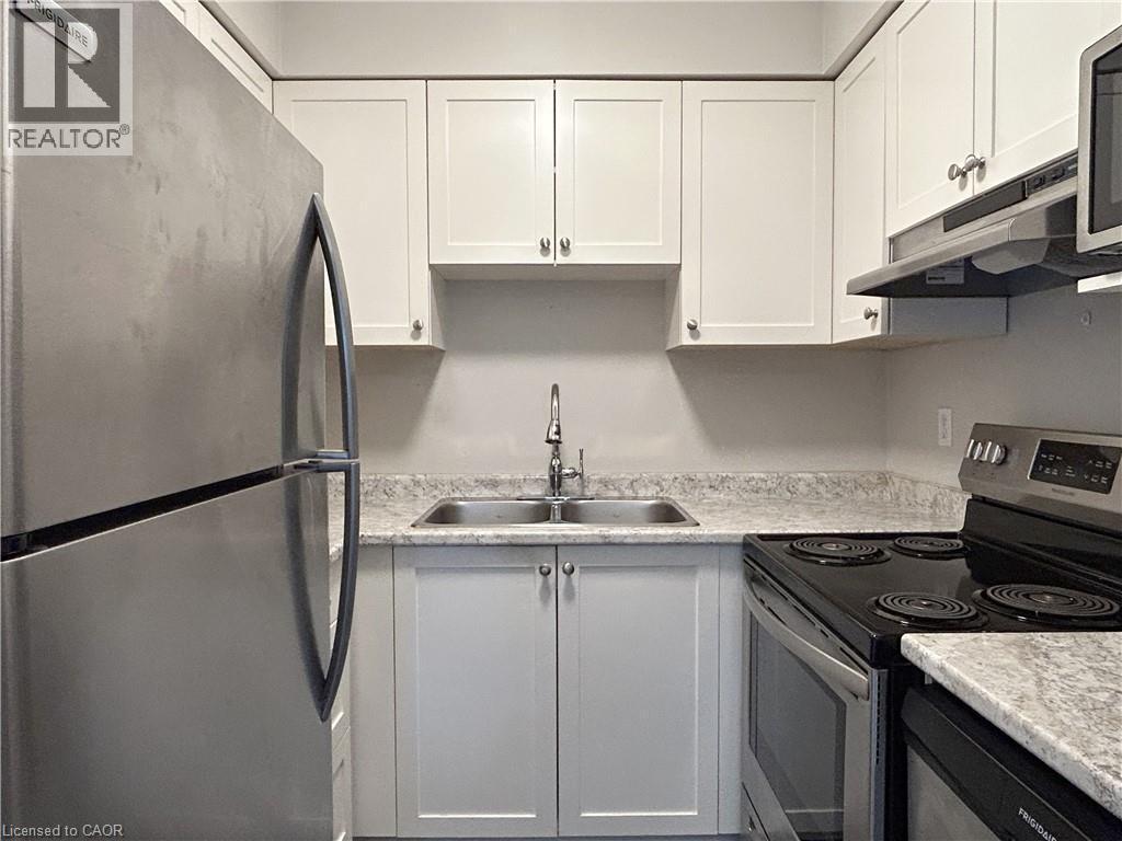 15 Montclair Crescent Unit# 2, Simcoe, ON - Indoor Photo Showing Kitchen With Double Sink