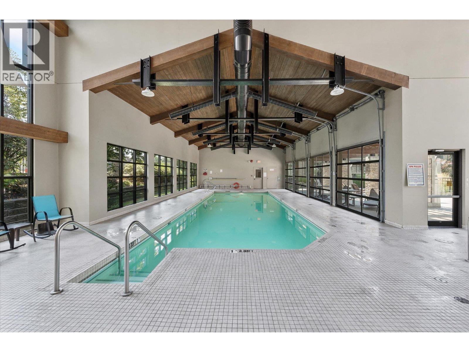 4380 Lakeshore Road Unit# 206, Kelowna, BC - Indoor Photo Showing Other Room With In Ground Pool