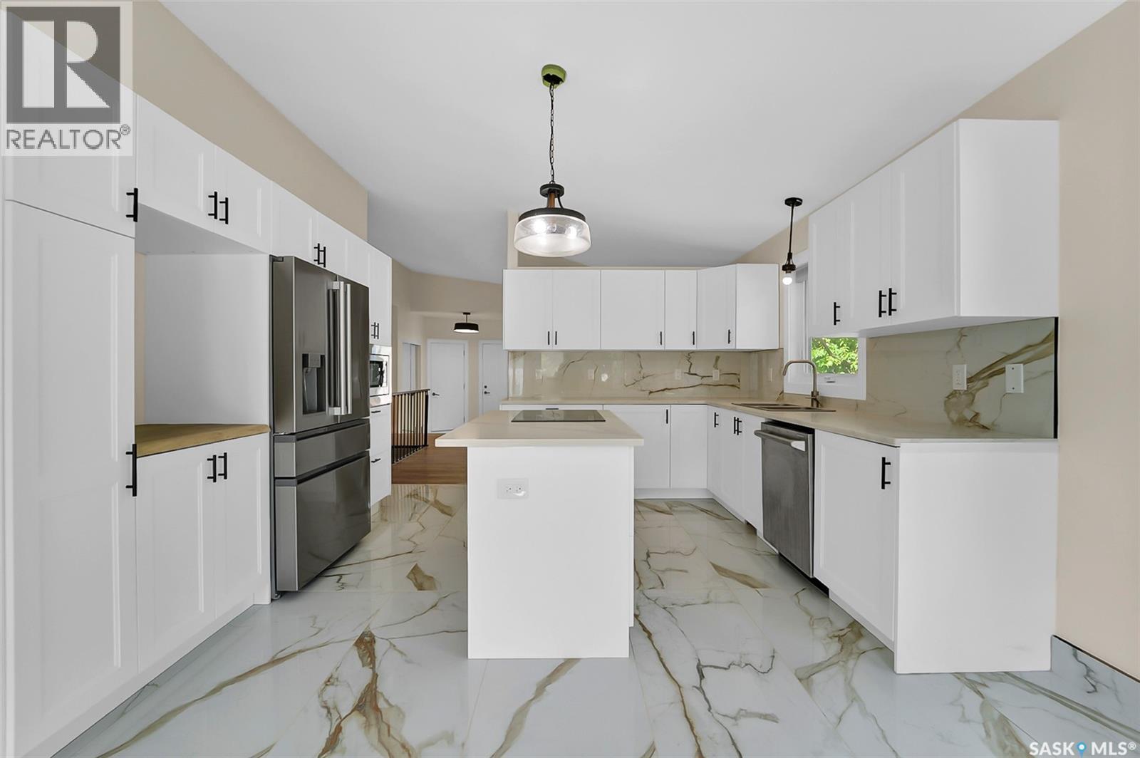 303 Haslam Crescent, Saskatoon, SK - Indoor Photo Showing Kitchen With Stainless Steel Kitchen