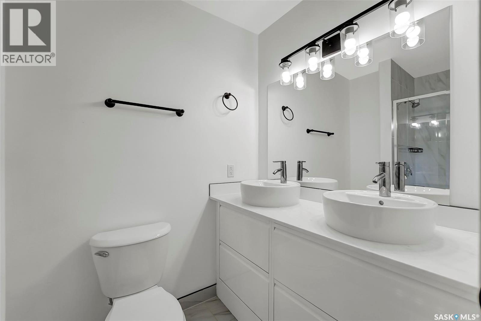 303 Haslam Crescent, Saskatoon, SK - Indoor Photo Showing Bathroom