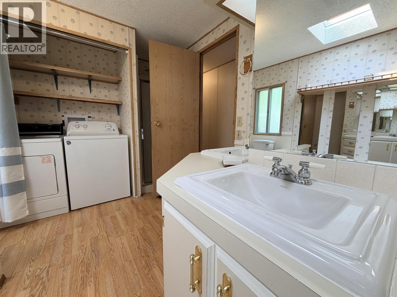 10 2155 Commodore Crescent, Williams Lake, BC - Indoor Photo Showing Laundry Room