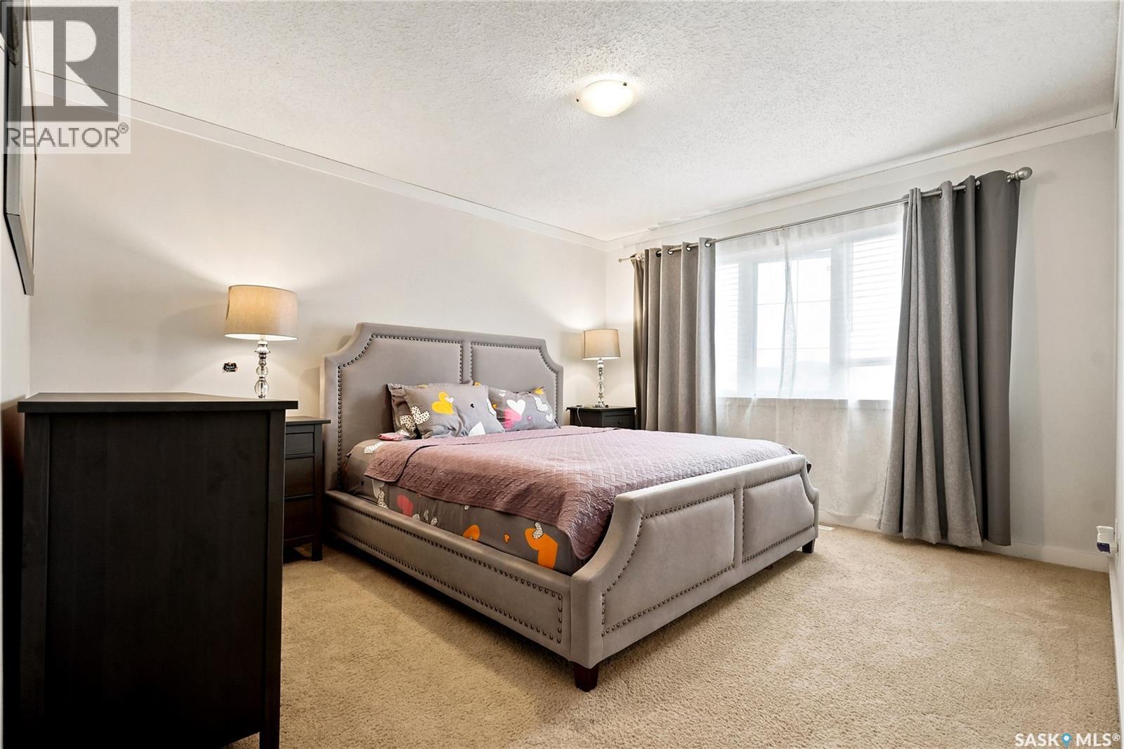 102 410 Ledingham Way, Saskatoon, SK - Indoor Photo Showing Bedroom