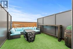 View of grassy yard with outdoor furniture - 