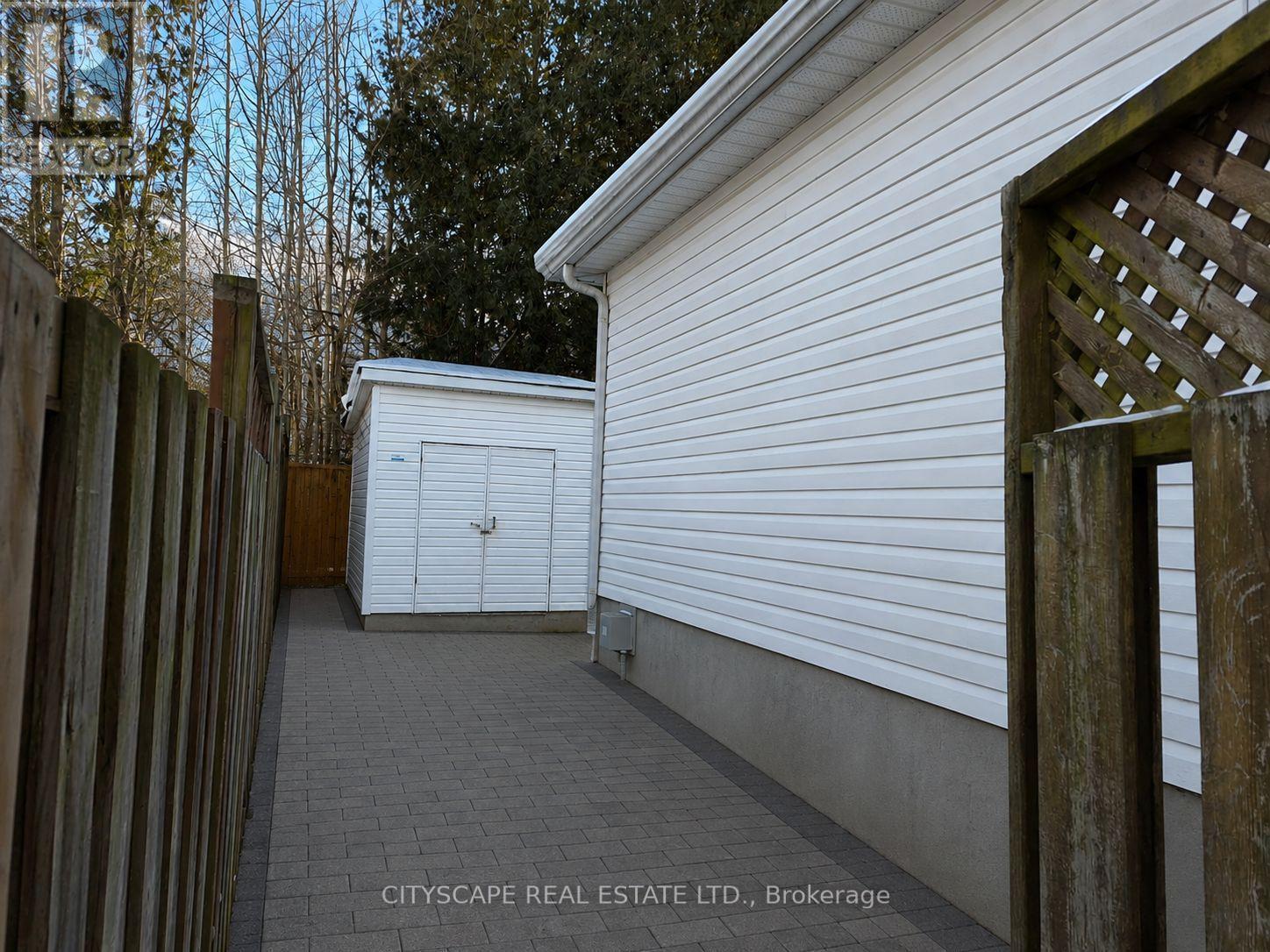 Side Yard - virtually edited - 60 Castlewood Place, Cambridge, ON - Outdoor With Exterior