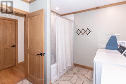 second bathroom with main floor laundry - 