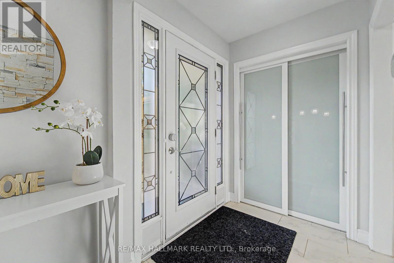 front entry updated exterior and closet door - 117 Clappison Boulevard, Toronto, ON - Indoor Photo Showing Other Room