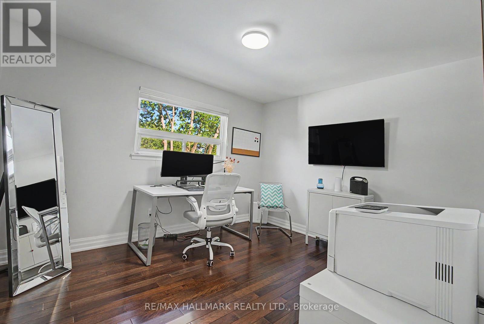 2nd bedroom hardwood overlooks pool - 117 Clappison Boulevard, Toronto, ON - Indoor Photo Showing Office