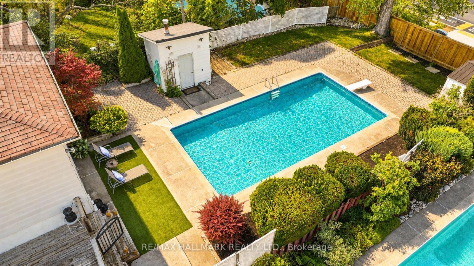heated pool - 117 Clappison Boulevard, Toronto, ON - Outdoor With In Ground Pool With Deck Patio Veranda