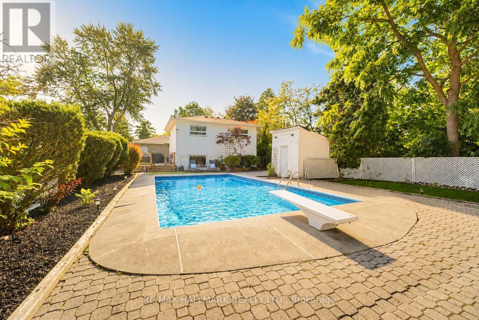 fully fenced yard - 117 Clappison Boulevard, Toronto, ON - Outdoor With In Ground Pool With Backyard