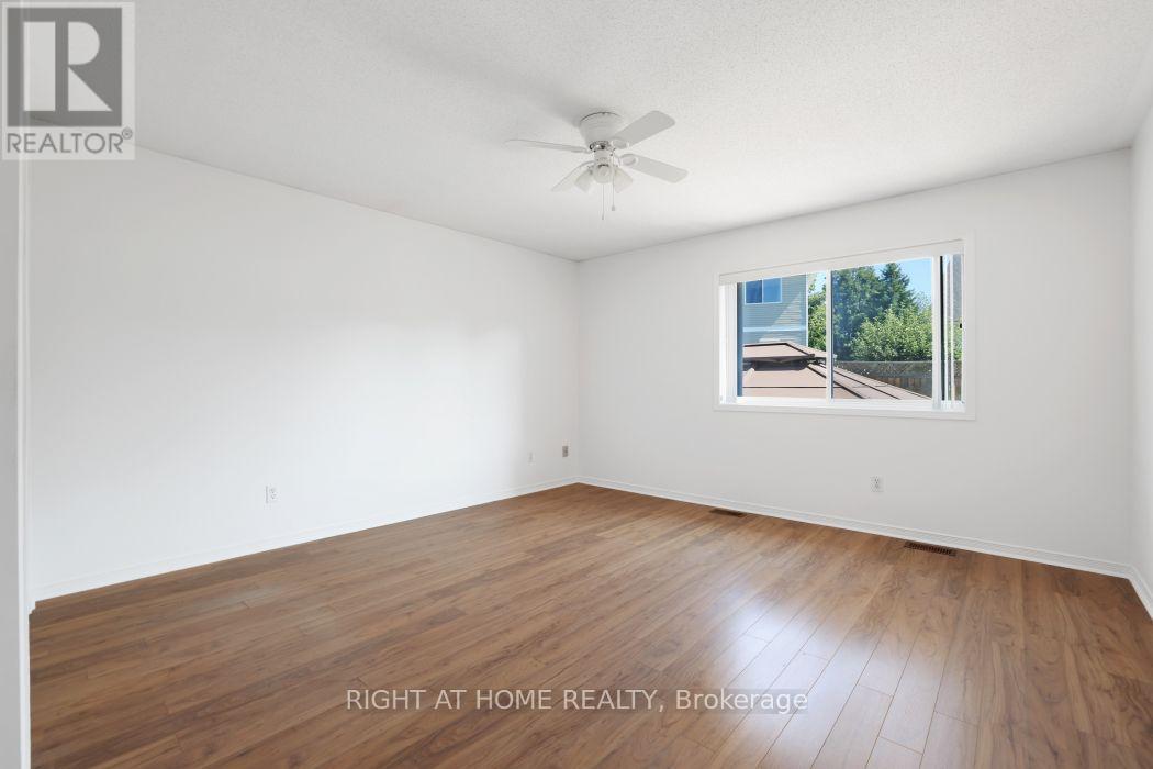 Generous primary bedroom faces the backyard - 53 Yoho Drive, Ottawa, ON - Indoor Photo Showing Other Room