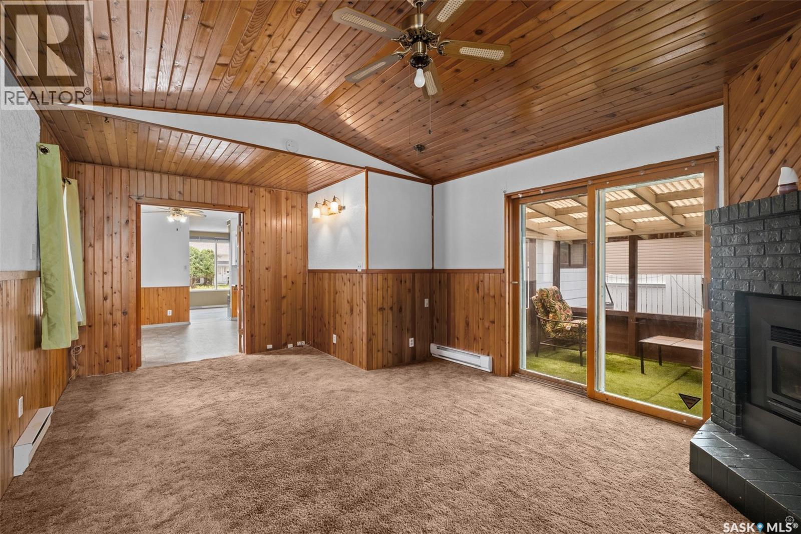 1338 Lacroix Crescent, Prince Albert, SK - Indoor Photo Showing Other Room With Fireplace