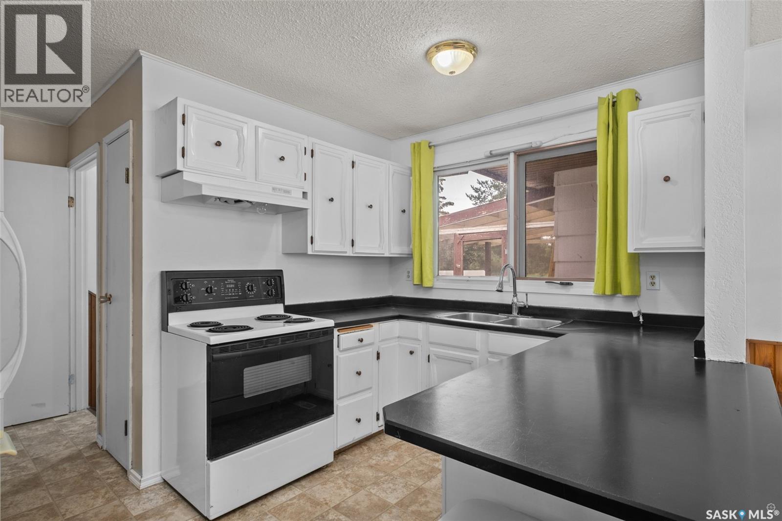 1338 Lacroix Crescent, Prince Albert, SK - Indoor Photo Showing Kitchen With Double Sink
