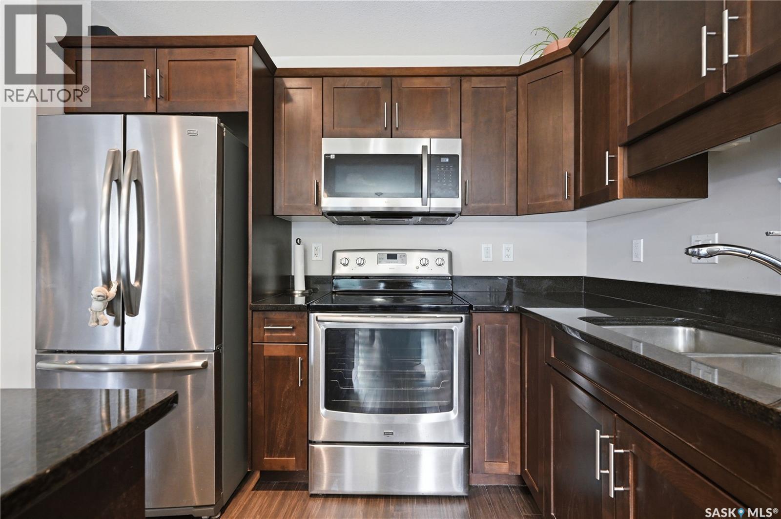 14 502 Rempel Manor, Saskatoon, SK - Indoor Photo Showing Kitchen With Stainless Steel Kitchen